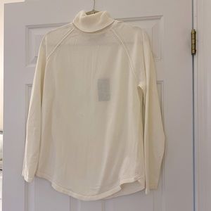 Jeanne Pierre cream turtleneck sweater